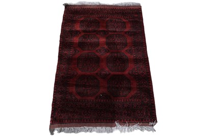 Lot 97 - A late 20th Century hand-knotted Afghan rug