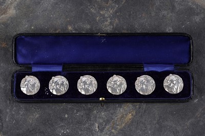 Lot 50 - An Edwardian cased set of six silver buttons retailed by Lawrence Emanuel