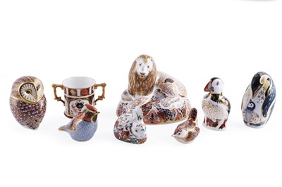 Lot 352 - A collection of Royal Crown Derby paperweights; and an Imari pattern loving cup