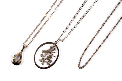 Lot 70 - A 9ct gold chain; a 9ct gold bird pattern pendant on chain; and one further necklace