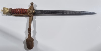 Lot 1196 - A German Second World War Kriegsmarine dress dagger with hangers and belt