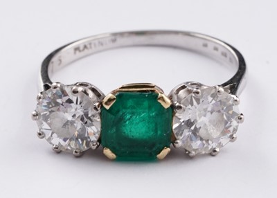 Lot 685 - A three stone emerald and diamond ring