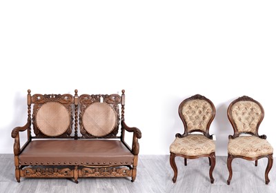 Lot 38 - An early 20th Century Jacobean style bergère sofa; and a pair of Victorian salon chairs