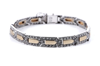 Lot 514 - A modern Art Deco style white spinel and 14ct gold bracelet