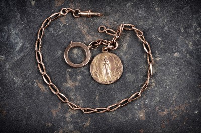 Lot 68 - A yellow metal watch chain, with religious gilt fob medallion depicting the Madonna