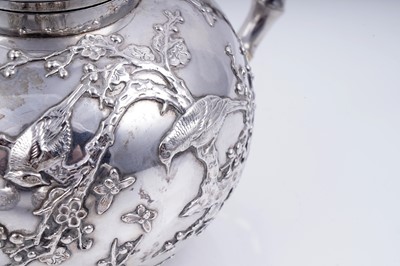 Lot 160 - A late 19th Century Chinese silver three-piece tea service; and a pair of silver sugar tongs