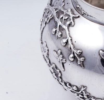 Lot 160 - A late 19th Century Chinese silver three-piece tea service; and a pair of silver sugar tongs