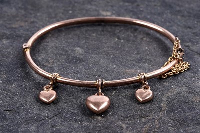 Lot 46 - An Edwardian 9ct rose gold bangle