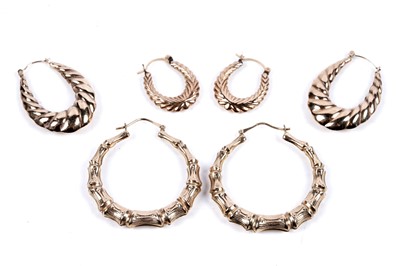 Lot 286 - Two pairs of 9ct gold hoop earrings; and one further similar