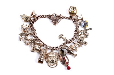 Lot 331 - A 9ct yellow gold charm bracelet
