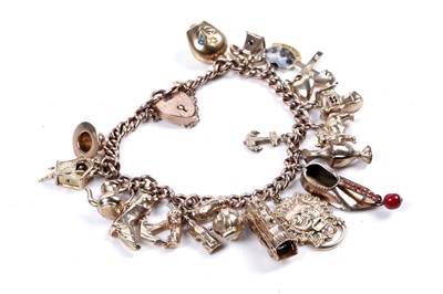 Lot 331 - A 9ct yellow gold charm bracelet