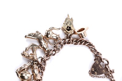 Lot 331 - A 9ct yellow gold charm bracelet