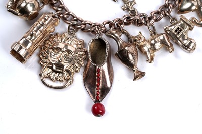 Lot 331 - A 9ct yellow gold charm bracelet