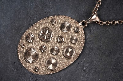 Lot 60 - A 1970's Modernist 9ct rose gold pendant on chain