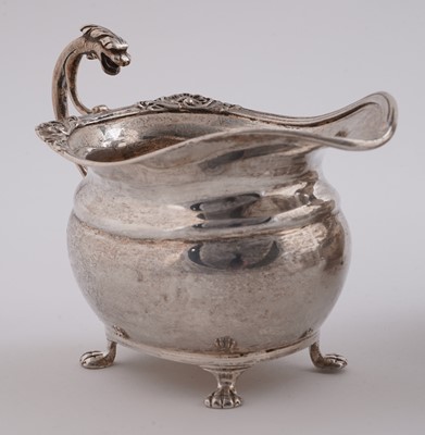 Lot 542 - A George V silver four-piece tea service