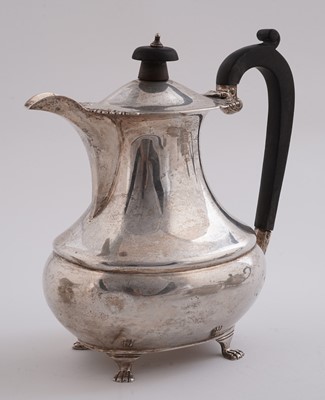 Lot 542 - A George V silver four-piece tea service