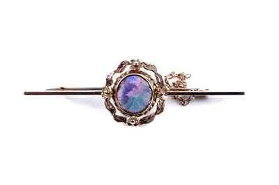 Lot 55 - An Edwardian black opal bar brooch