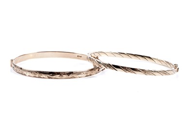 Lot 334 - Two 9ct gold hinged bangles