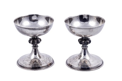 Lot 140 - Two silver limited edition “Lincoln Chalices”, by A. E. Jones.