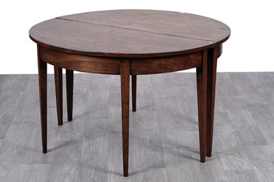 Lot 52 - A George III mahogany 'D' end dining table