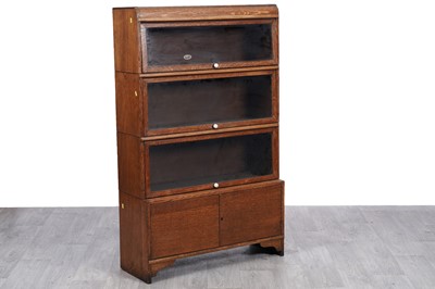 Lot 49 - Wilton: an early 20th Century oak sectional bookcase