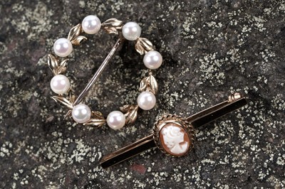 Lot 214 - A cultured pearl wreath pattern brooch; and a cameo brooch