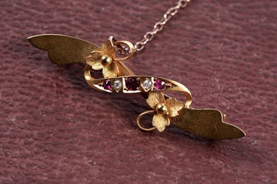 Lot 6 - A late Victorian ruby and diamond set Art Nouveau bar brooch