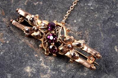 Lot 7 - A late Victorian pink tourmaline bar brooch of Gothic influence