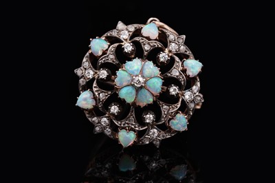 Lot 493 - An Edwardian opal and diamond brooch pendant