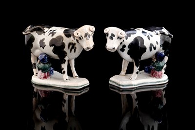 Lot 369 - A pair of Northern cow creamers