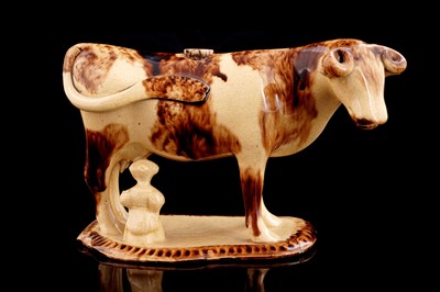 Lot 371 - A 19th Century cow creamer