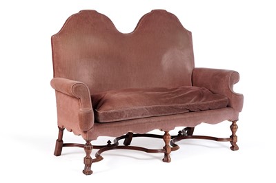 Lot 562 - An early 20th Century three seat camel back sofa