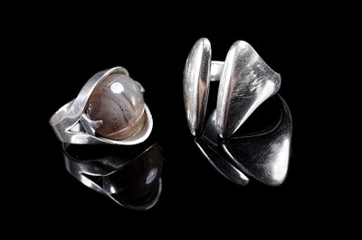 Lot 556 - A Danish Modernist silver ring designed by Hans Hansen; and a 1960's agate and silver ring