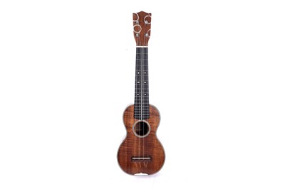Lot 46 - A Martin style 3K soprano ukulele; and two cases, one original