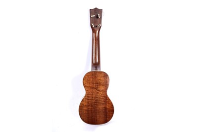 Lot 46 - A Martin style 3K soprano ukulele; and two cases, one original