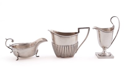 Lot 467 - Three silver jugs