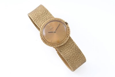 Lot 613 - Omega: an 18ct yellow gold cased manual wind wristwatch