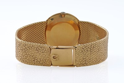 Lot 613 - Omega: an 18ct yellow gold cased manual wind wristwatch