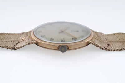 Lot 605 - Rolex Precision: a 9ct yellow gold cased manual wind wristwatch