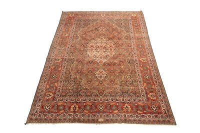 Lot 519 - A hand knotted Persian Tabriz carpet