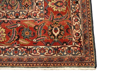 Lot 519 - A hand knotted Persian Tabriz carpet