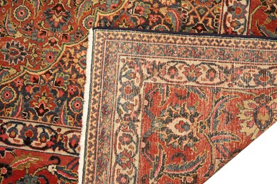 Lot 519 - A hand knotted Persian Tabriz carpet