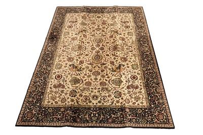 Lot 527 - A machine made Qum style carpet