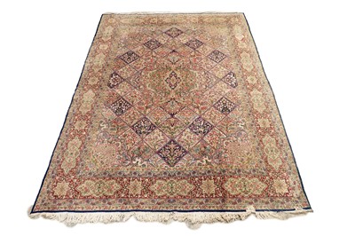 Lot 535 - A hand knotted Persian Kirman carpet