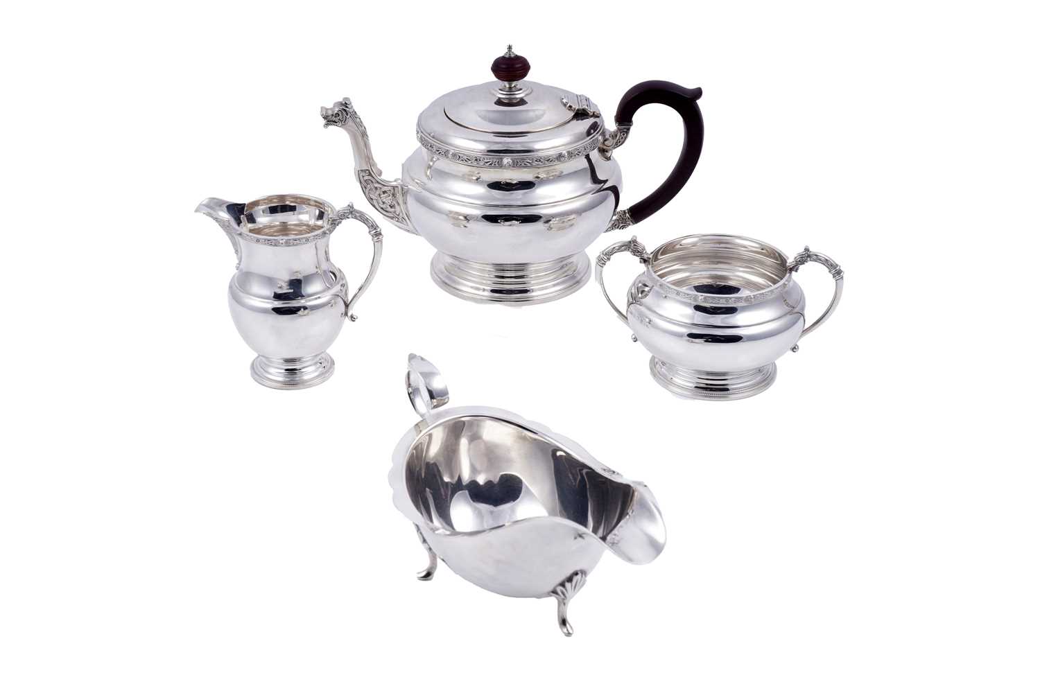 Lot 142 - A George V silver teapot; and other silver items
