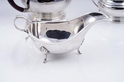 Lot 142 - A George V silver teapot; and other silver items