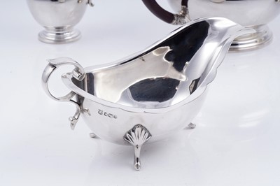 Lot 142 - A George V silver teapot; and other silver items