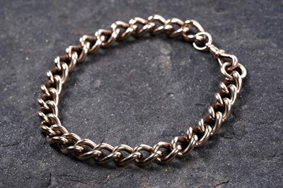 Lot 599 - A 9ct gold curb-link watch chain