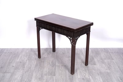 Lot 5 - A Regency mahogany and walnut inlaid Chippendale-style card table