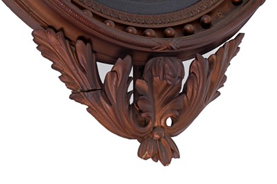 Lot 544 - A Regency style convex wall mirror